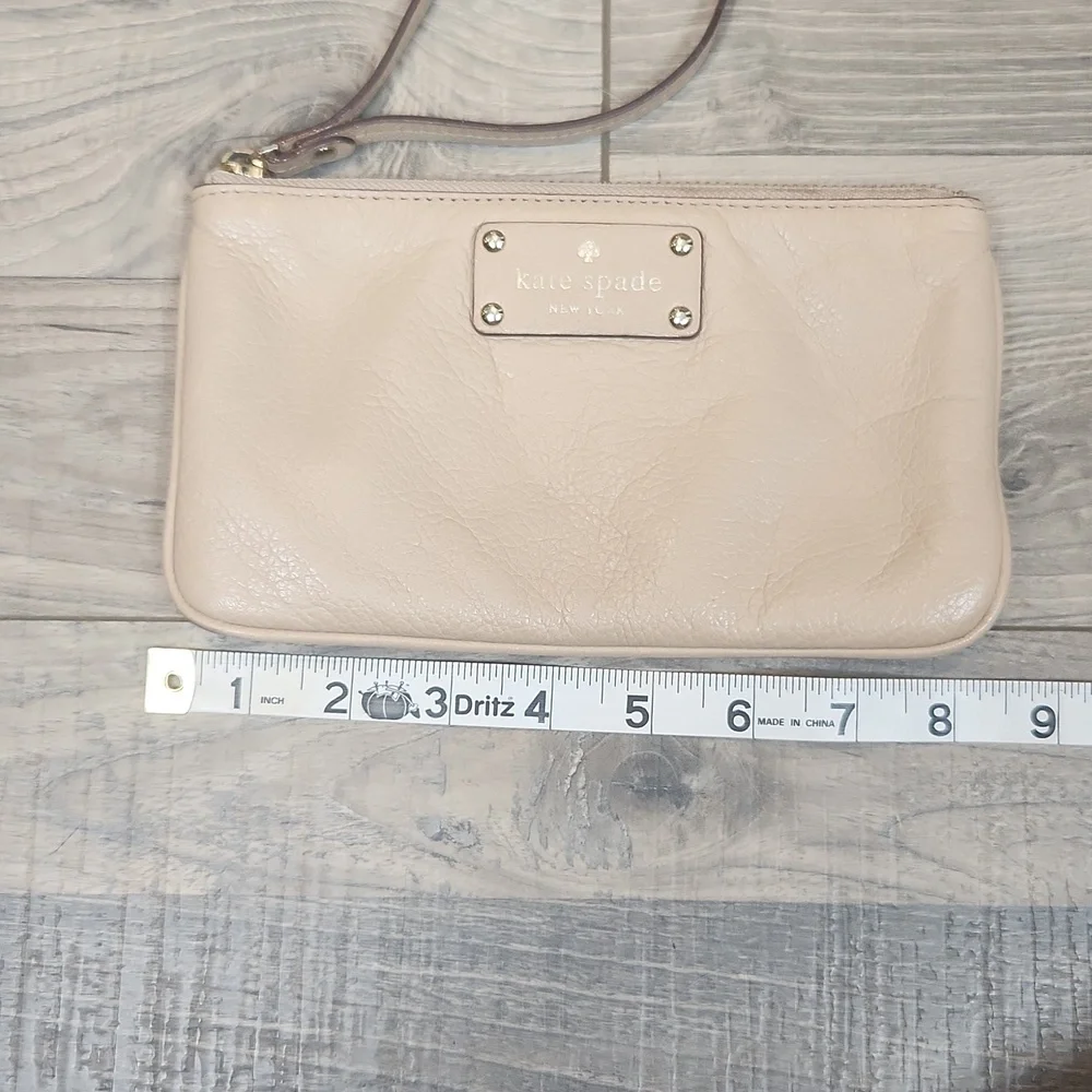 Kate Spade Leather Cream Wristlet with Navy Blue Interior‎